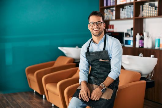 Man in shop apron